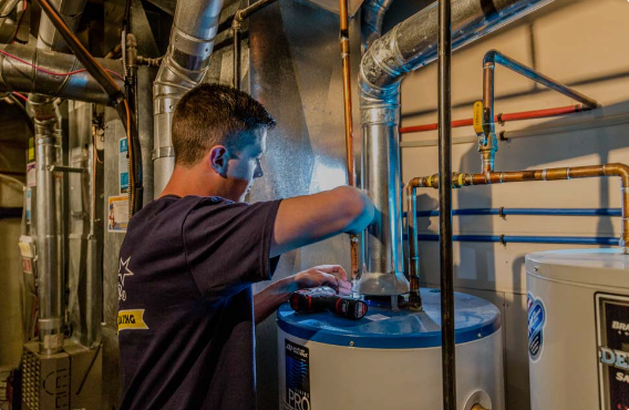 Young Man doing a plumbing service in a residential home